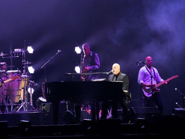 <p>Billy Joel in concert at Wembley Stadium</p>