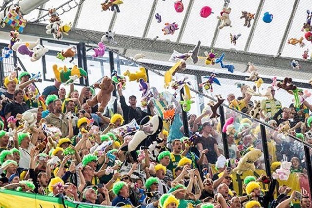 Den Haag supporters hurl their cuddly toys