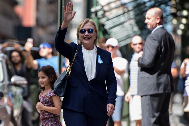 Hillary Clinton emerges from daughter's apartment after feeling unwell.