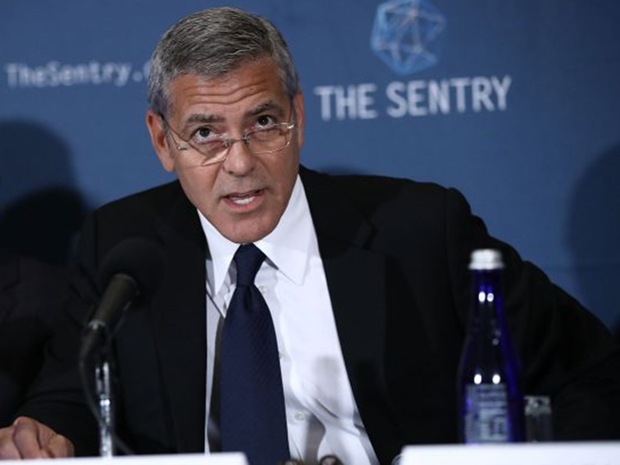 George Clooney addresses the problems of corruption in South Sudan at the National Press Club Washington DC yesterday