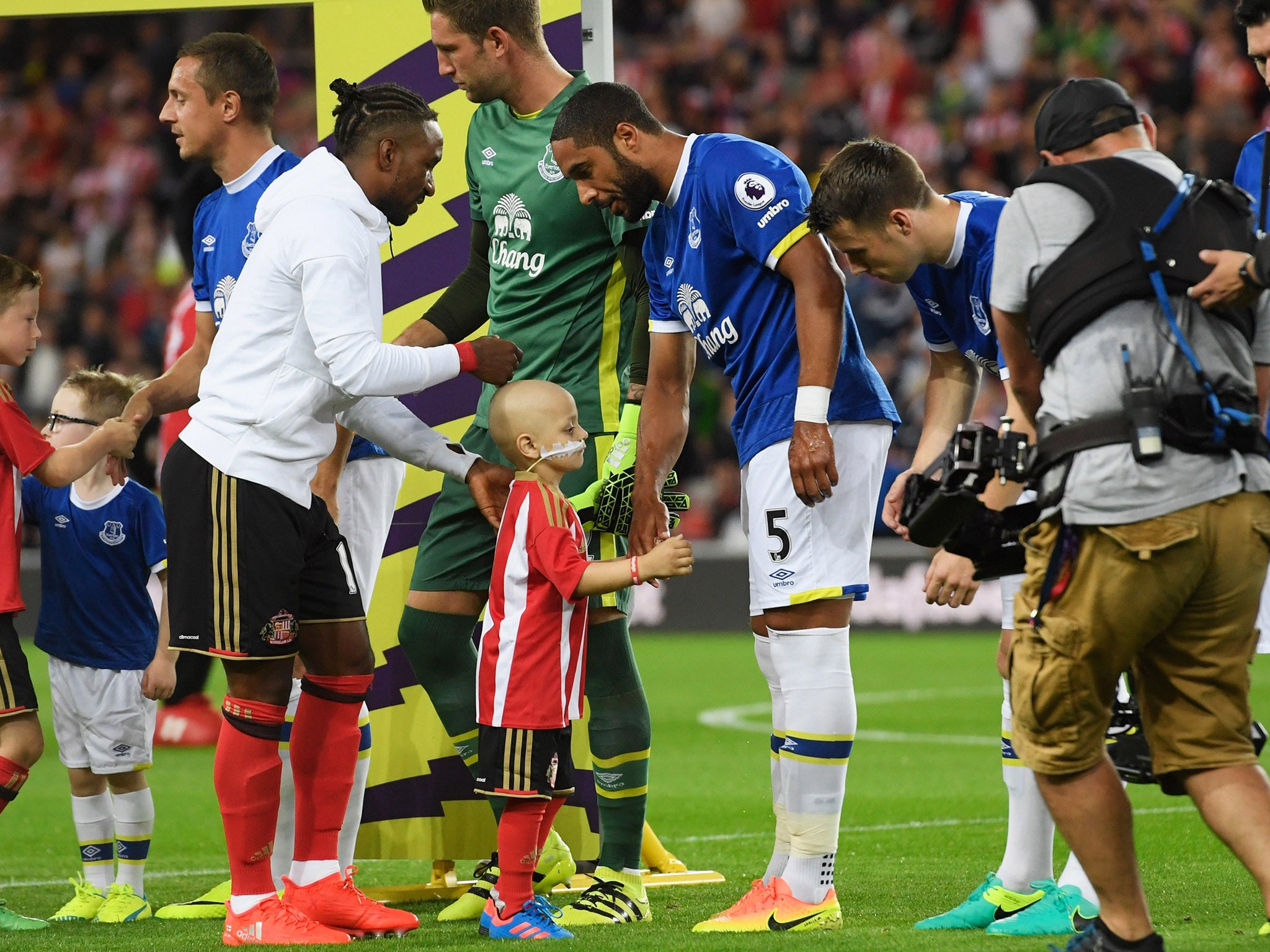 Bradley Lowery led the teams out before the game