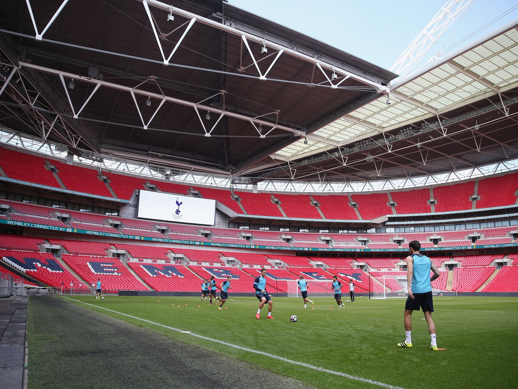 Tottenham get used to the feel of the Wembley pitch ahead of Wednesday night's Champions League clash