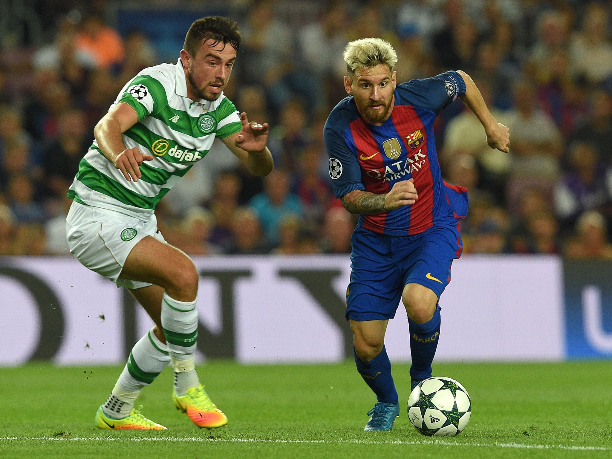 Messi bypasses Celtic's Eoghan O'Connell at the Nou Camp