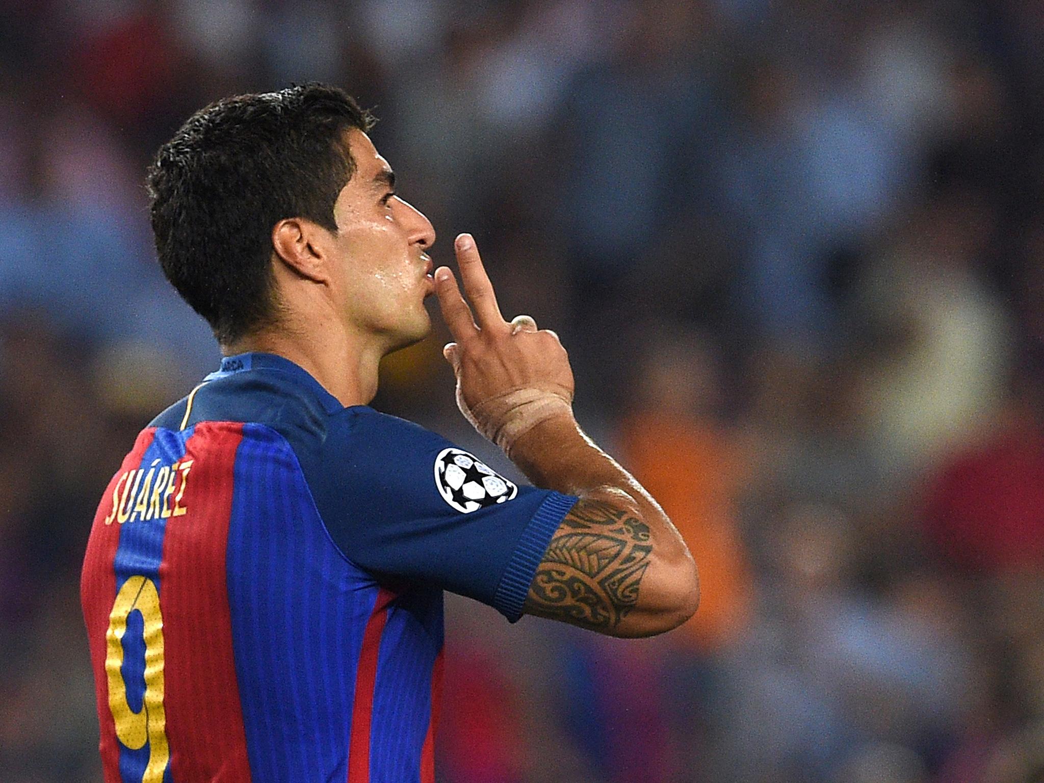 Suarez grabbed a brace over his former manager's side