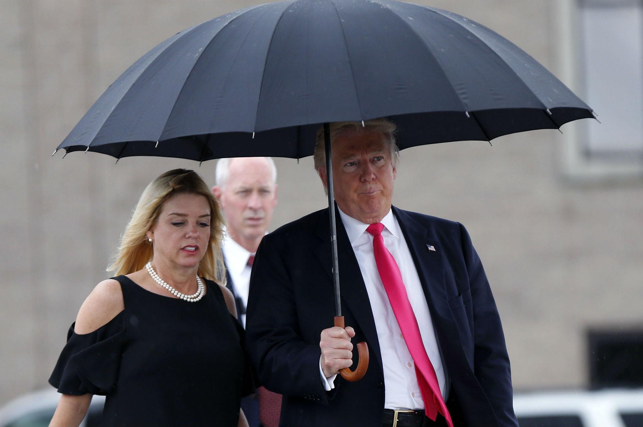 Florida Attorney General Pam Bondi with Donald Trump. She has vowed to send one of the packets to the White House after the case is over