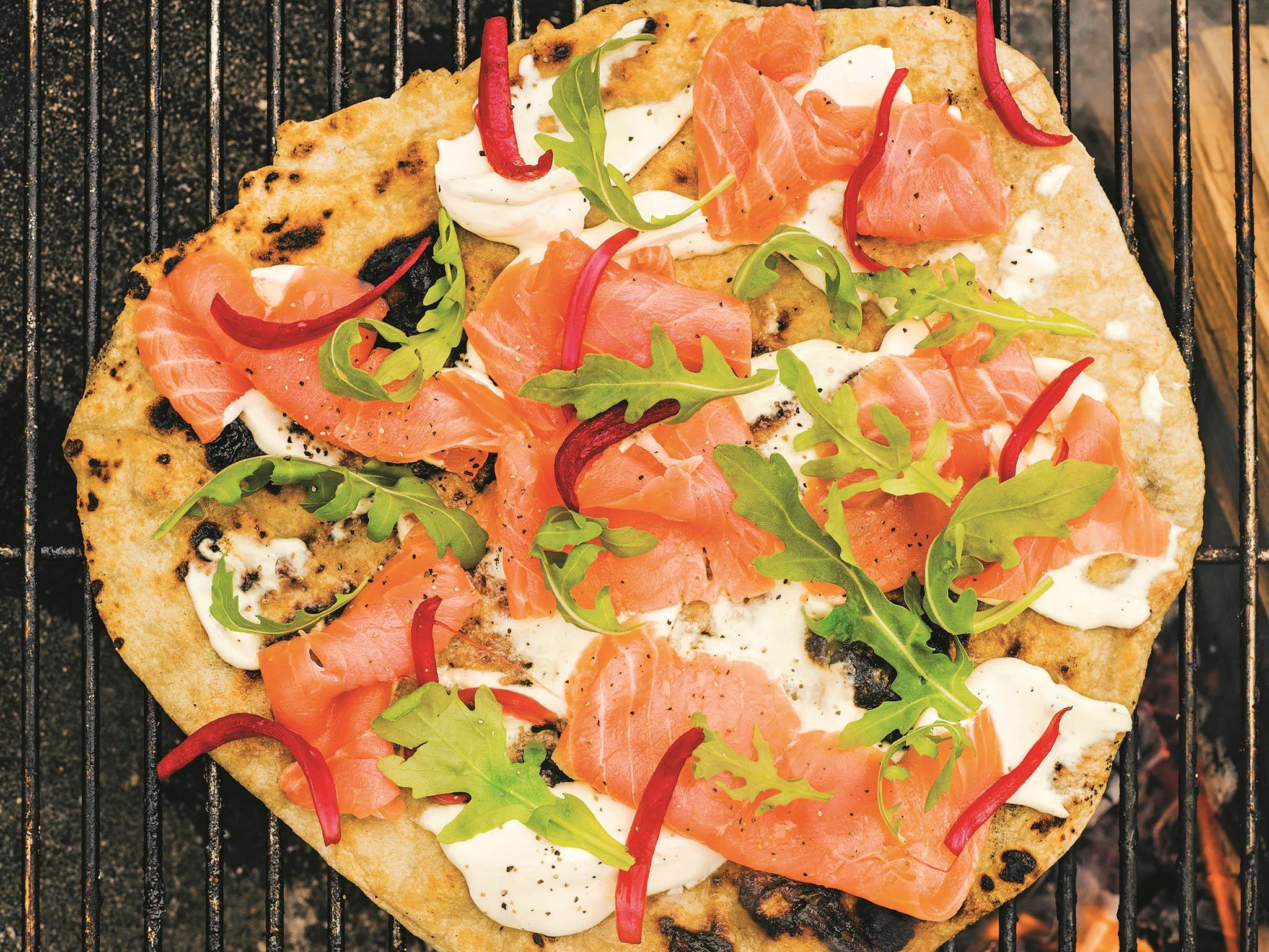 The Swedish Pizza: with smoked salmon, onions, homemade sour cream and rocket