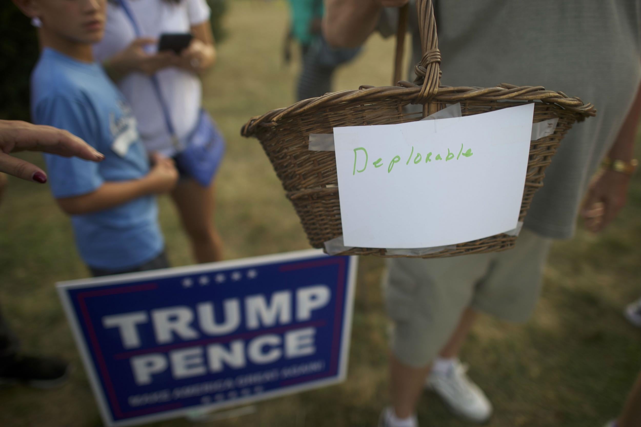 Trump supporter showing disdain for Clinton's 'deplorables' insult