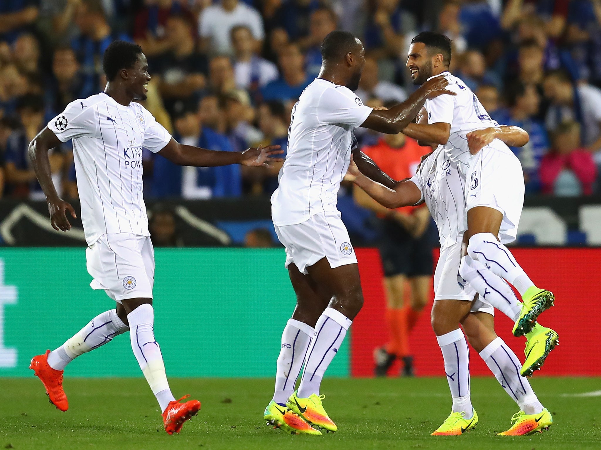 Mahrez is congratulated by his team-mates on his first goal