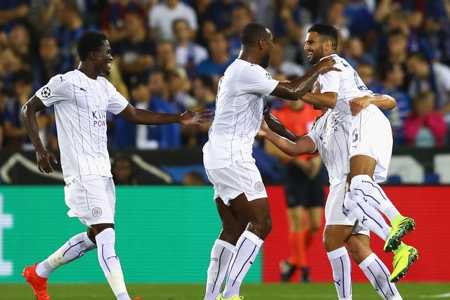 Mahrez is congratulated by his team-mates on his first goal