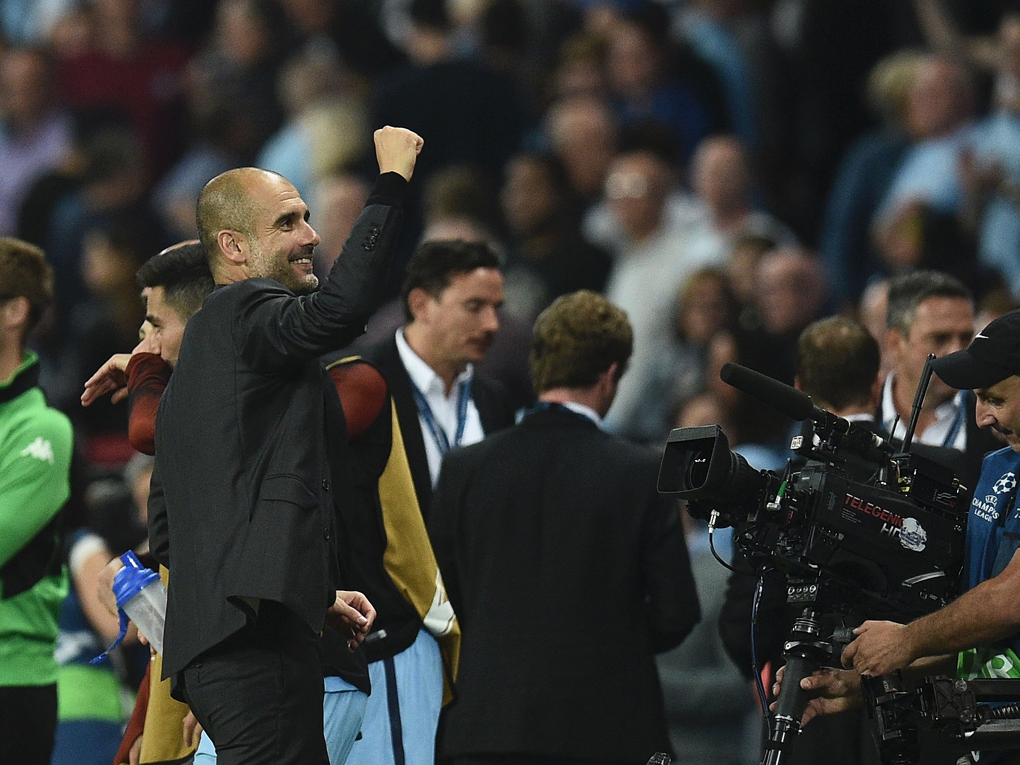 Guardiola gestures to the fans at full-time