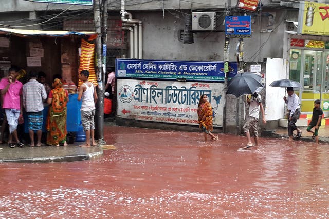 Dhaka's underdeveloped drainage system could not cope with heavy rains that mixed with the blood spilling from the animals