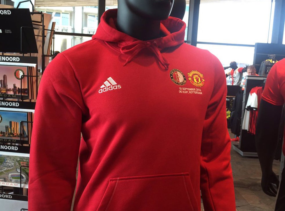 Feyenoord Vs Manchester United Half And Half Hoodies On Sale In Rotterdam Ahead Of Europa League Tie The Independent The Independent