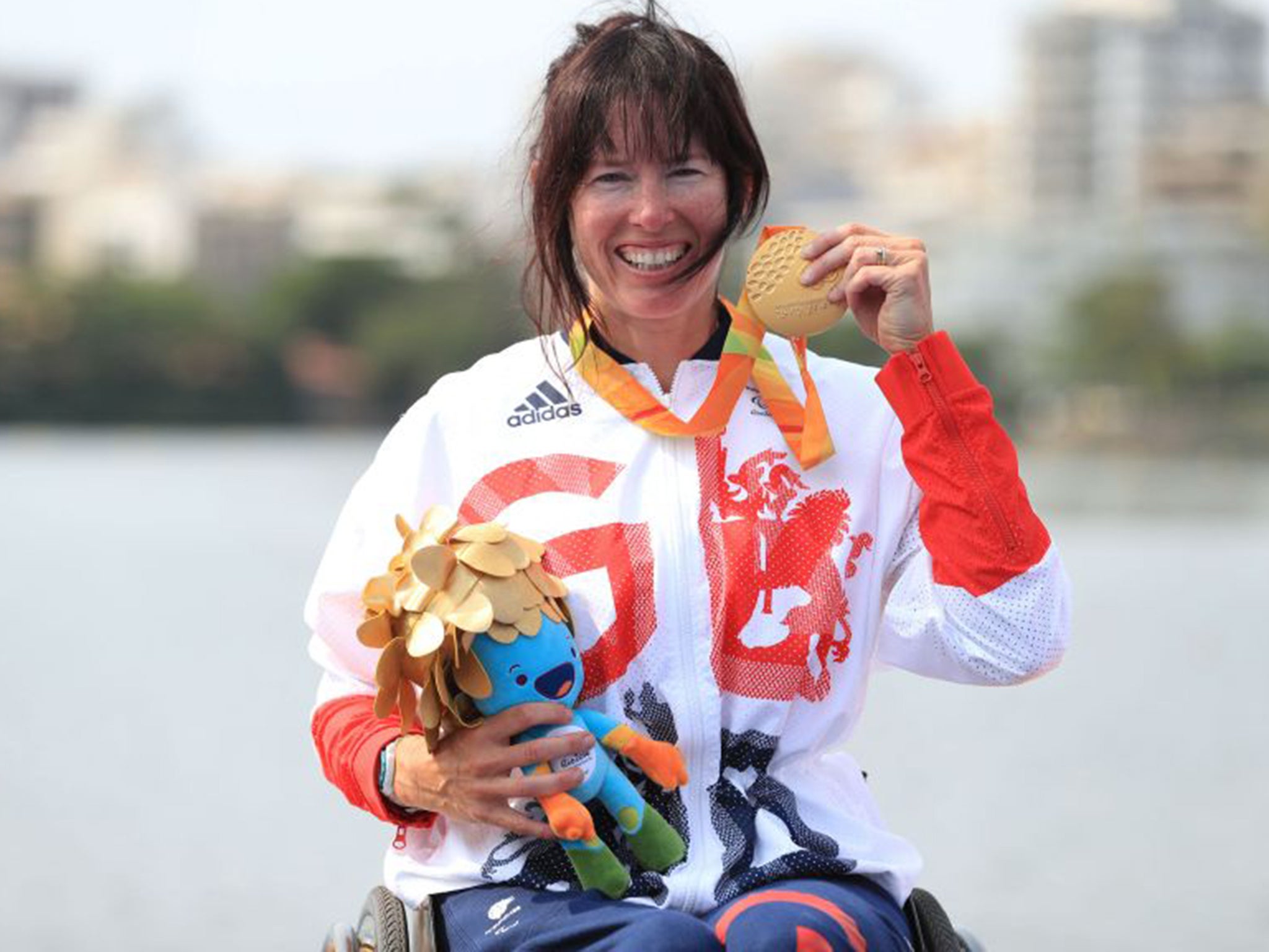 Jeanette Chippington celebrates with her Gold medal in the women's KL1 at the Lagoa Stadium yesterday