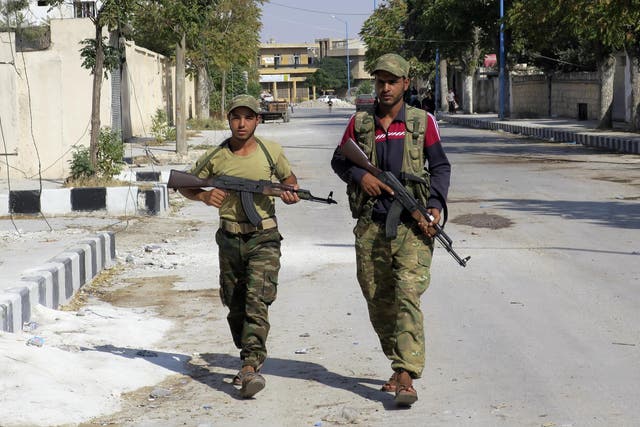 Free Syrian Army fighters on patrol in Jarablus
