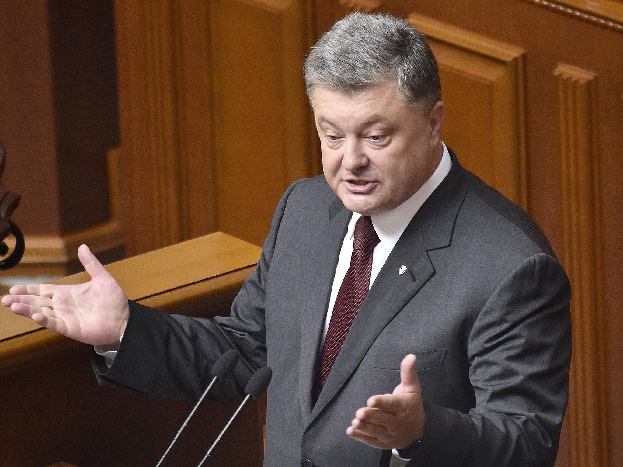 Ukrainian President Petro Poroshenko speaks during a session of the Parliament in Kiev