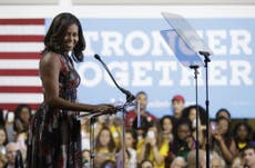 Michelle Obama fires up young voters for Hillary Clinton at first 2016 campaign appearance in Virginia