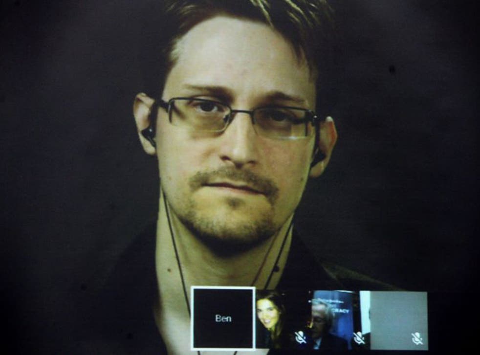 Snowden speaks via video link during the Athens Democracy Forum in 2016