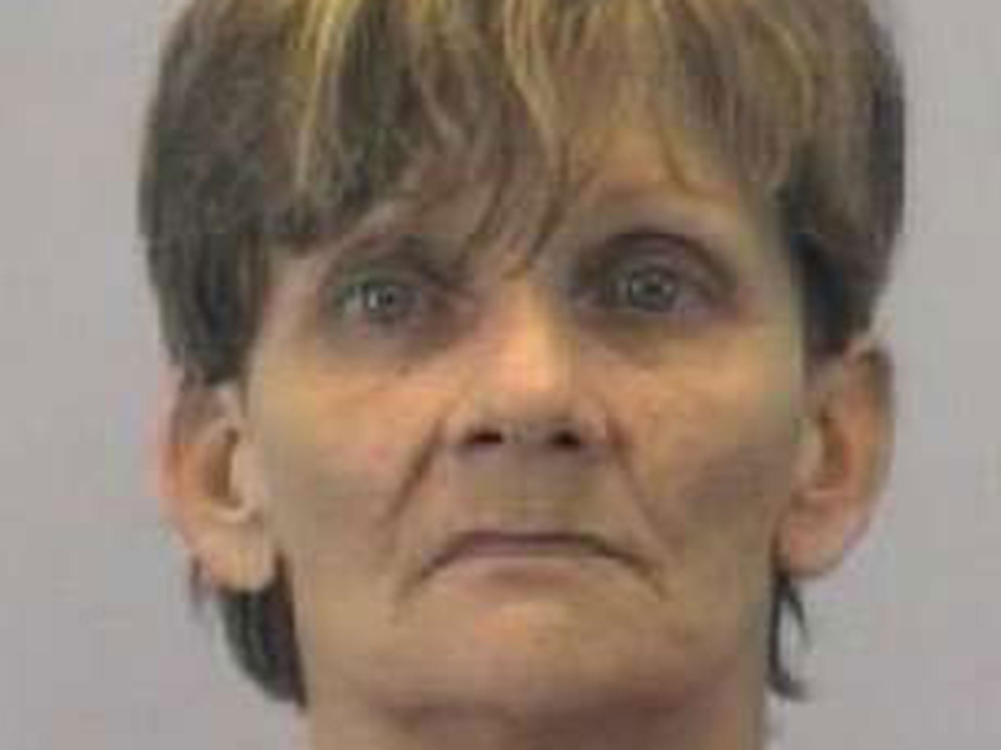 Marcella Jean Lee, 56, was arrested on charges of failing to report a death