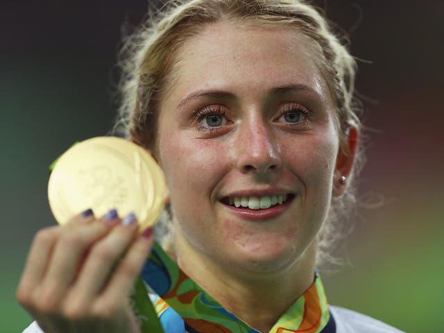 Trott poses with her women's omnium gold medal at the Rio Olympics