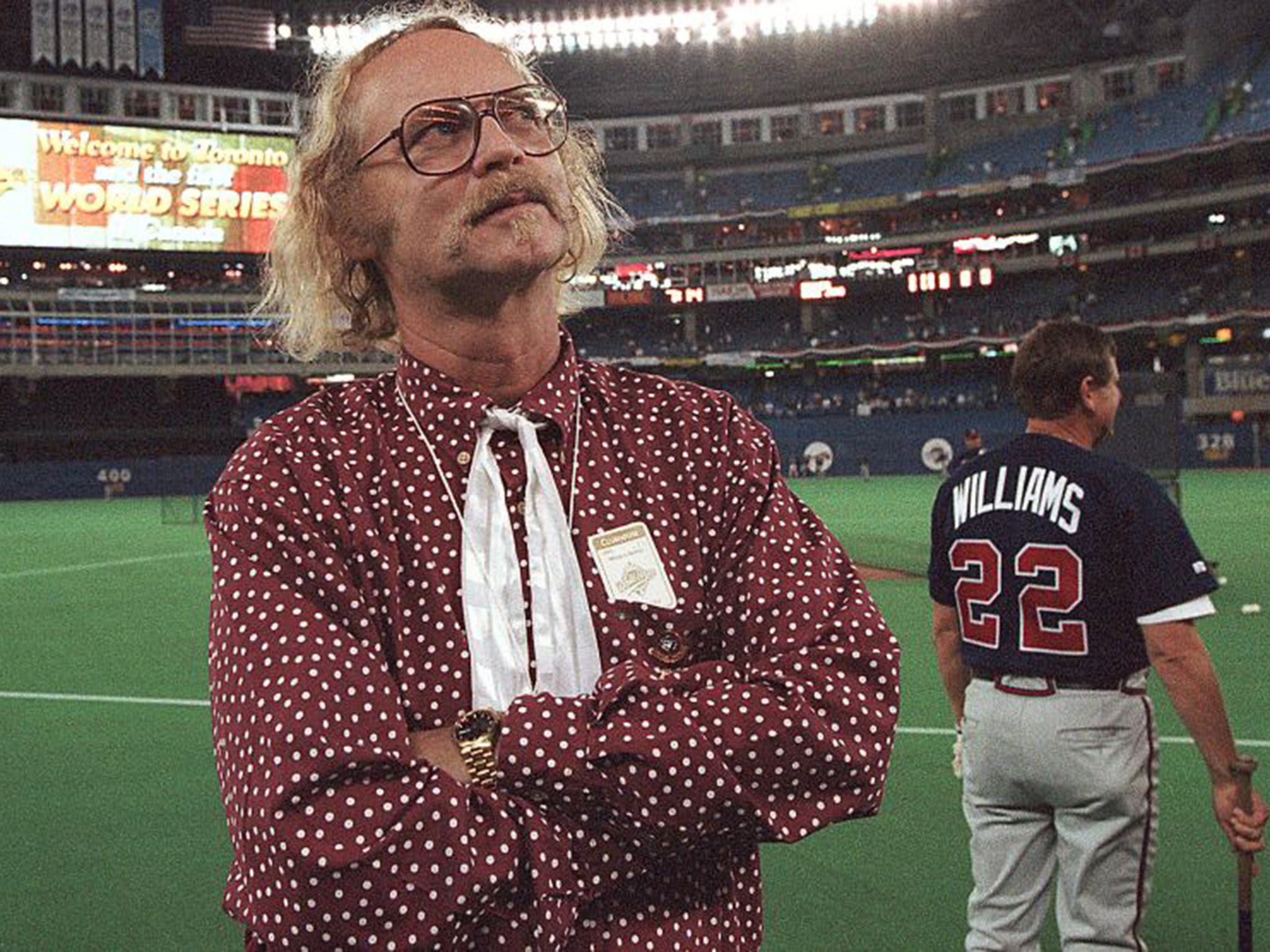 Canadian author W.P. Kinsella standing on the baseball field before game five of the World Series between Toronto Blue Jays and Atlanta Braves in 1992