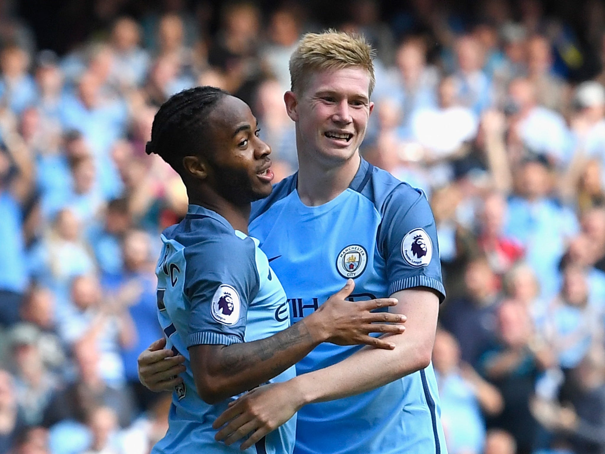 Sterling and De Bruyne celebrate City's third goal of the afternoon