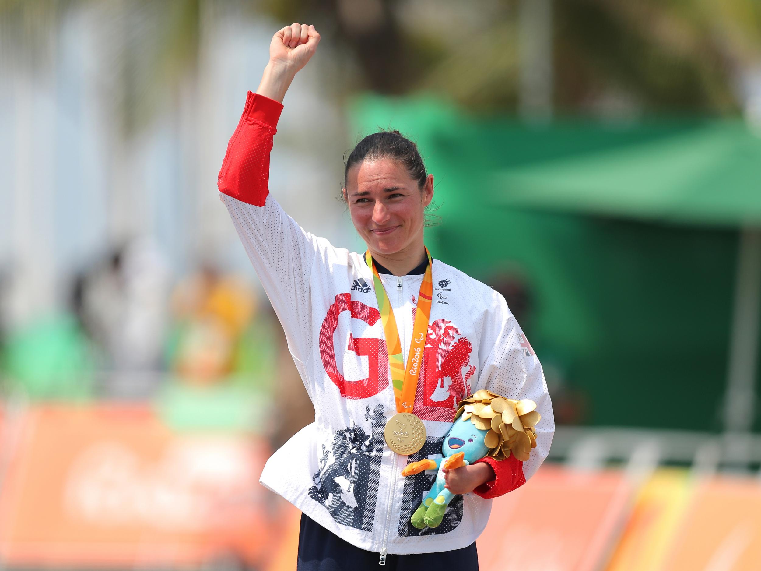 Great Britain's Sarah Storey celebrates with her gold medal after winning the Women's Road Race C4-5