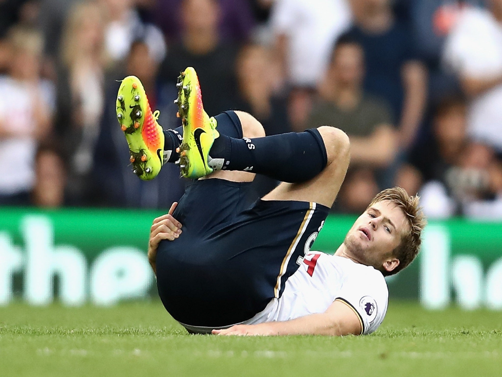 
Eric Dier goes down holding his hamstring 