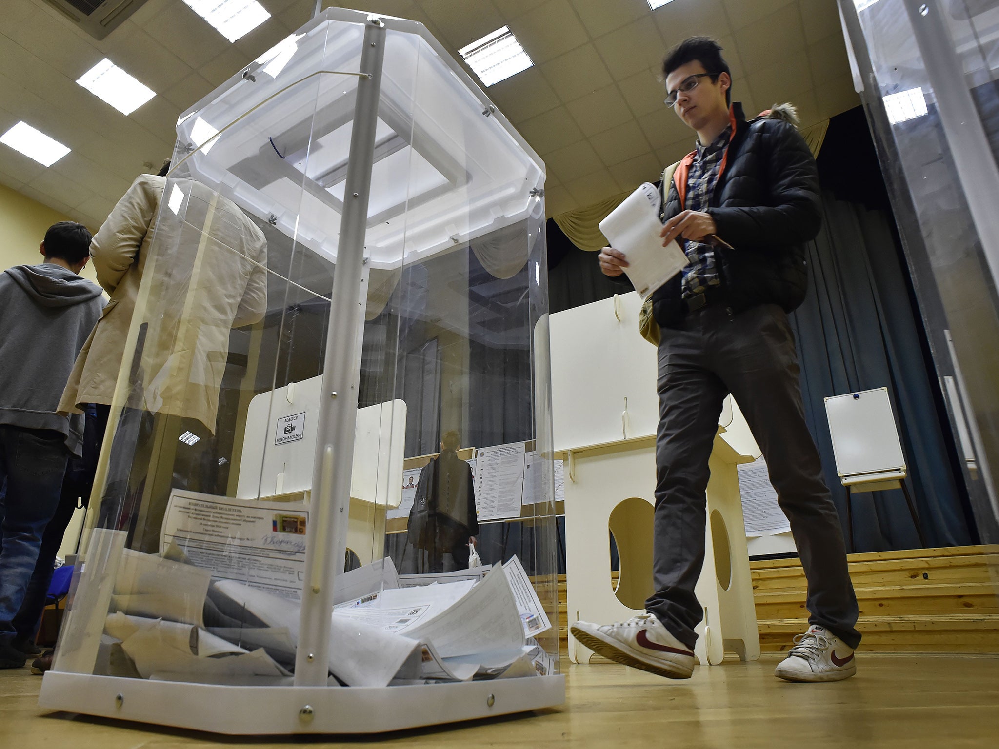 Voters casting their ballots at polling stations in Moscow. There has been widespread allegations of electoral fraud
