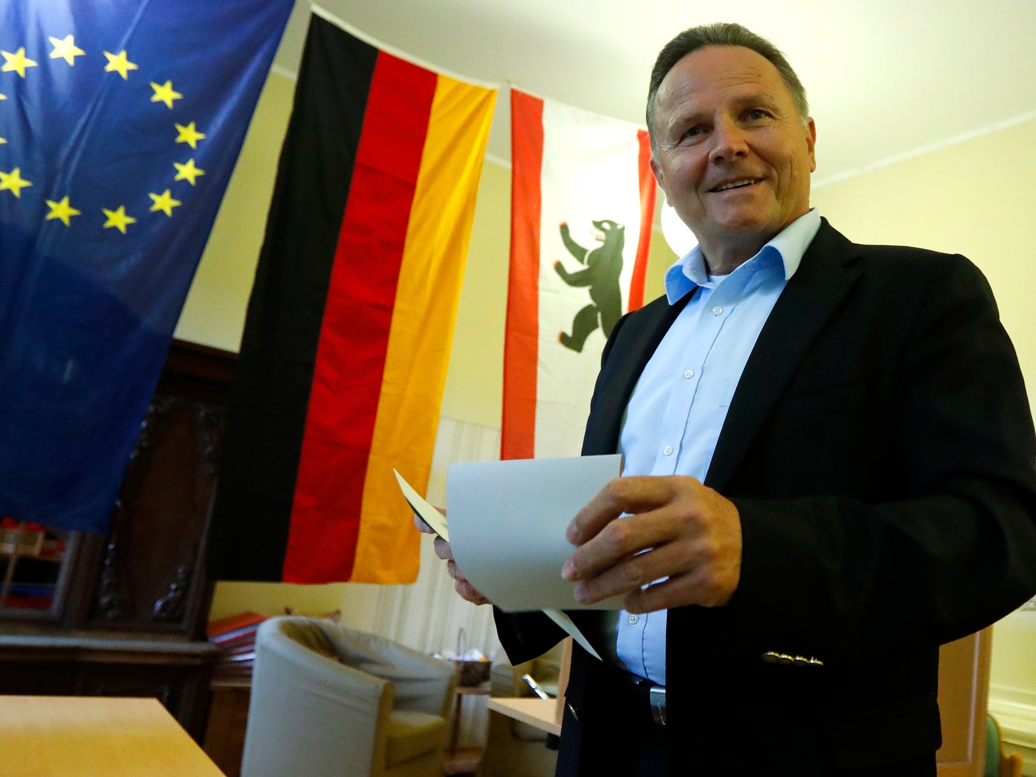 Top candidate of the anti-immigration party Alternative for Germany (AfD) Georg Pazderski casts his vote