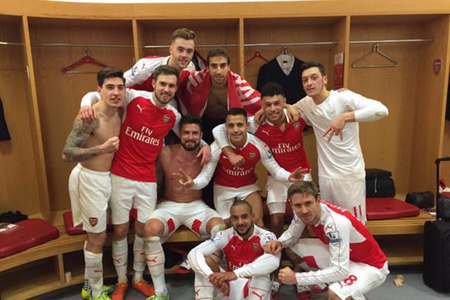 Arsenal players celebrated their 2-1 win over Leicester City last season by posting dressing room selfies on Twitter