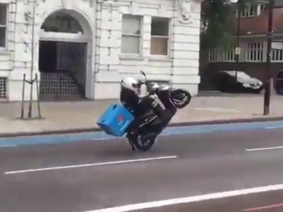 domino s pizza driver filmed doing wheelie down high street sparks investigation the independent the independent pizza driver filmed doing wheelie