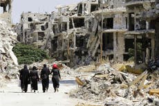More than 40 people killed in triple suicide bombing in Homs