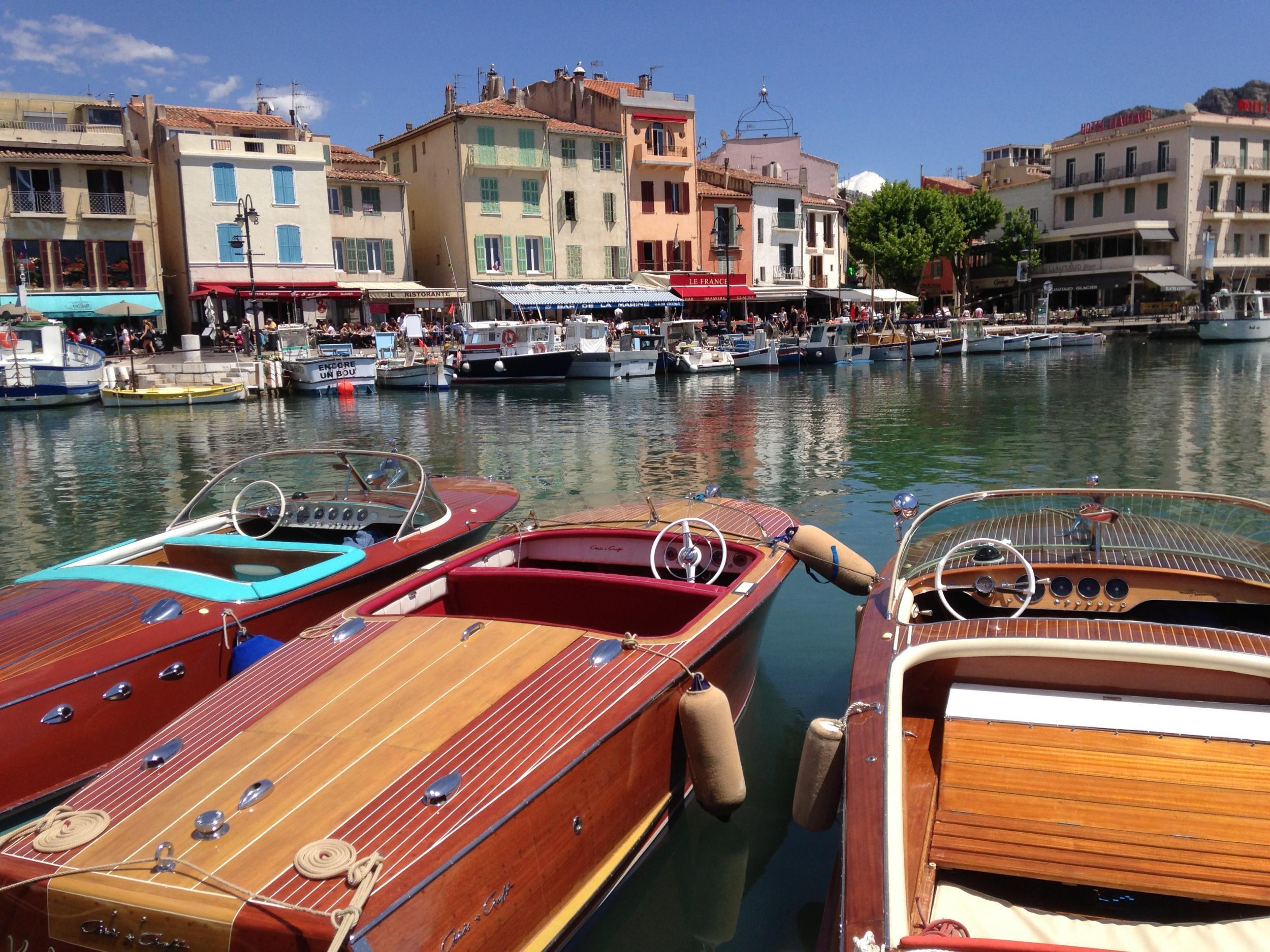 The harbour at Cassis, girded by picturesque pastel houses