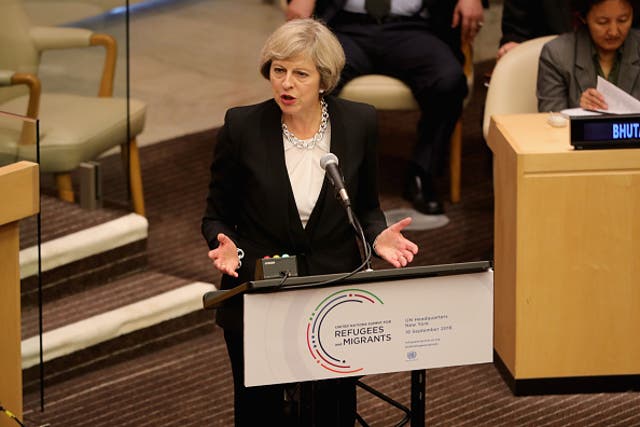 Theresa May addresses a special meeting on migration at the UN in New York