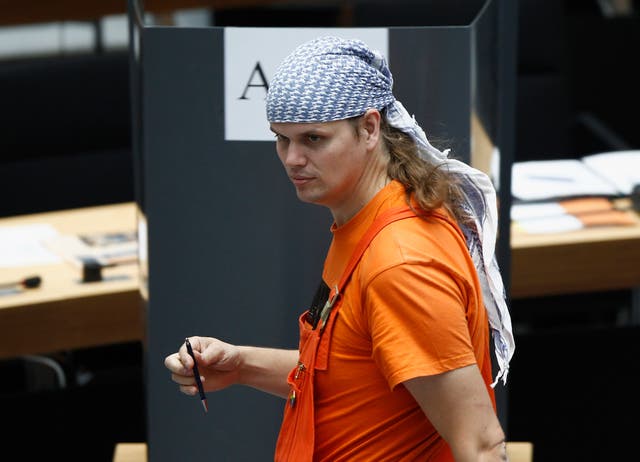 The Piratenpartei (Pirate Party) delegate Gerwald Claus-Brunner attends the first session of the Berlin City Parliament after the September 2011 local elections