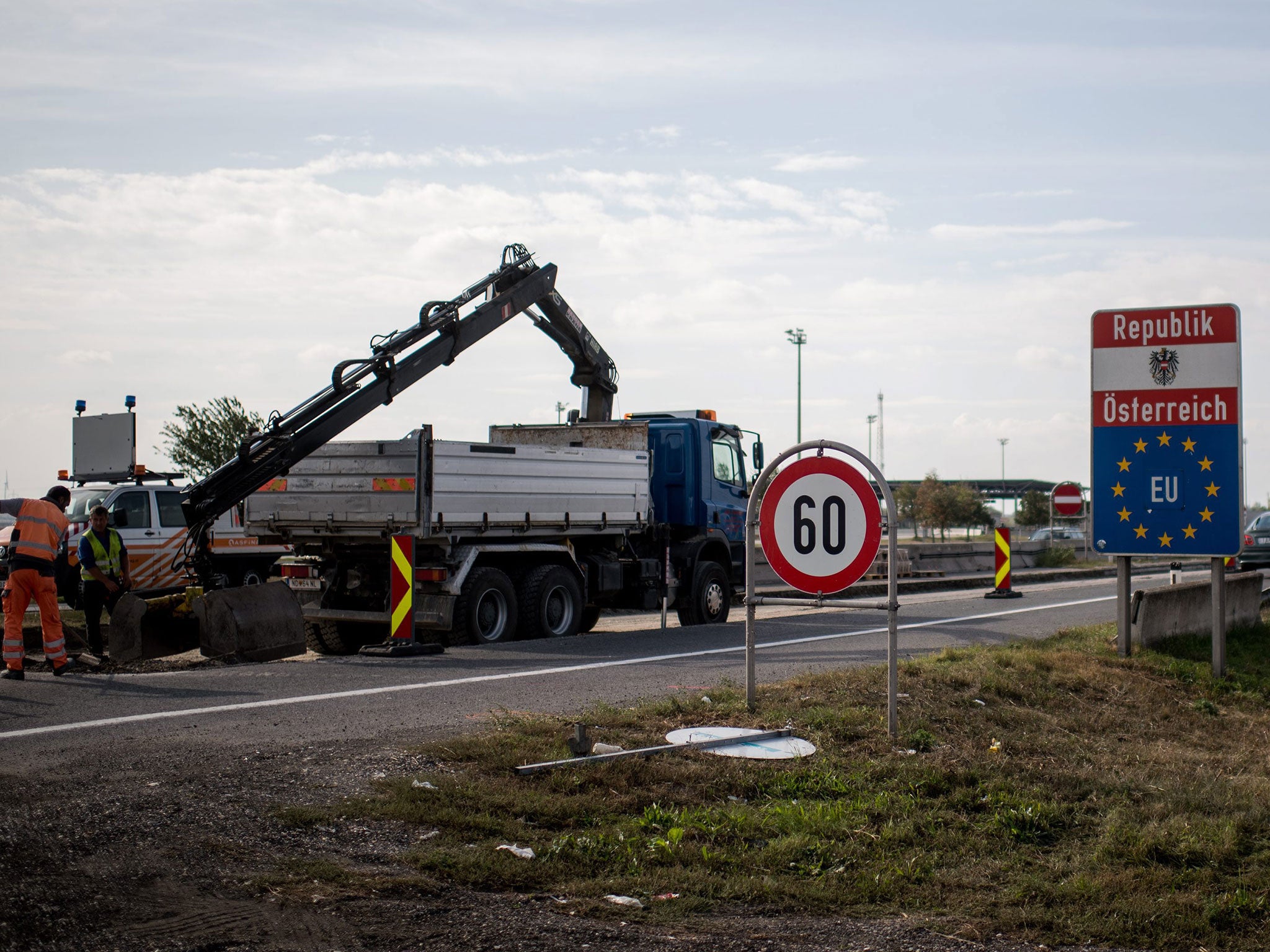 Construction workers making preparations for a fence along the Austrian Hungarian border near Nickelsdorf on 19 September 2016.