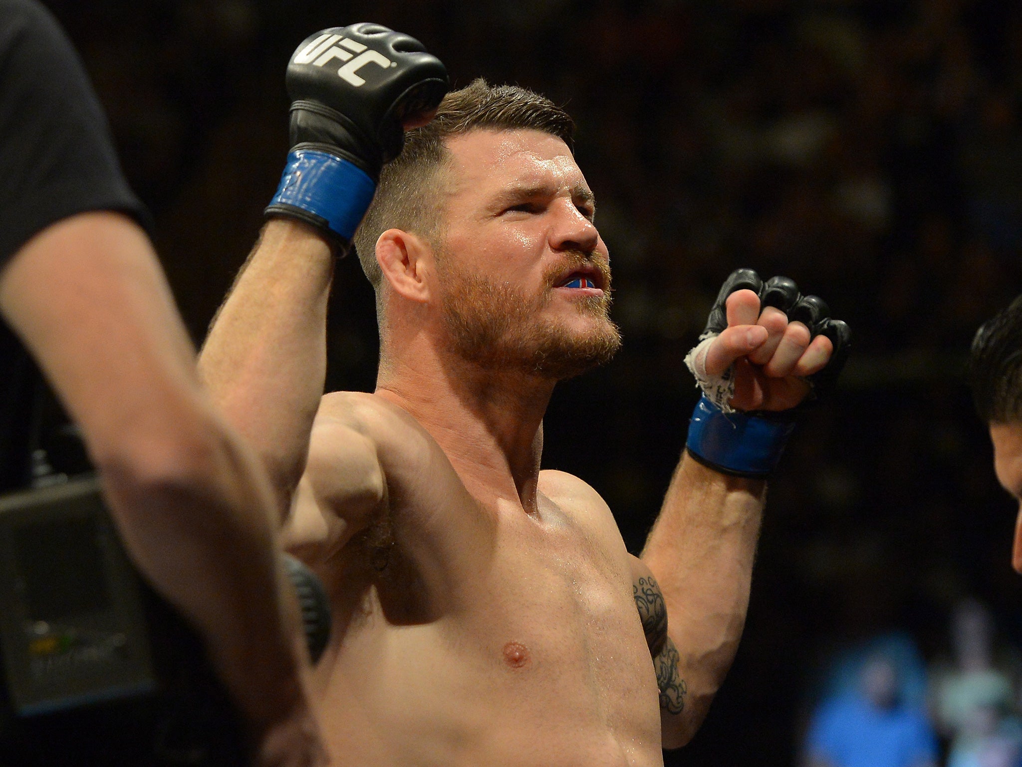 Bisping salutes the crowd at UFC 199