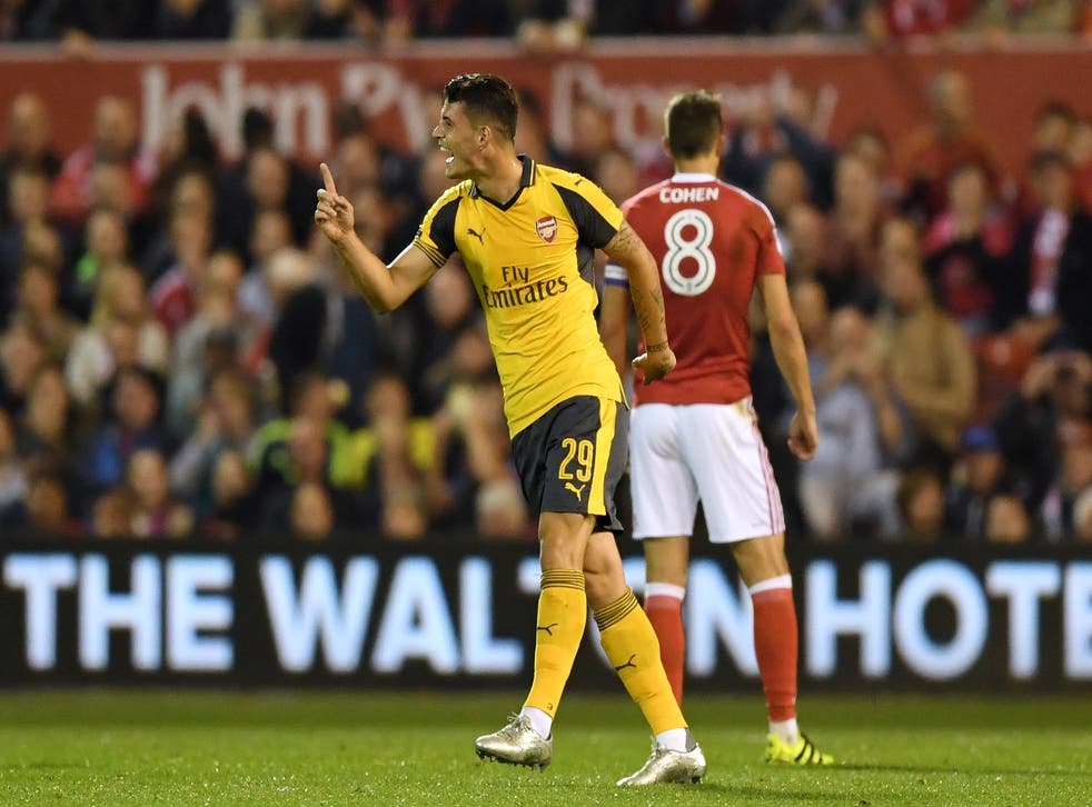 Granit Xhaka celebrates after striking a 35-yard effort to put Arsenal ahead of Nottingham Forest