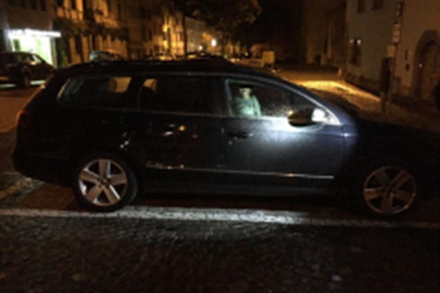 Police photo showing the boy left alone in the car while his mother went clubbing