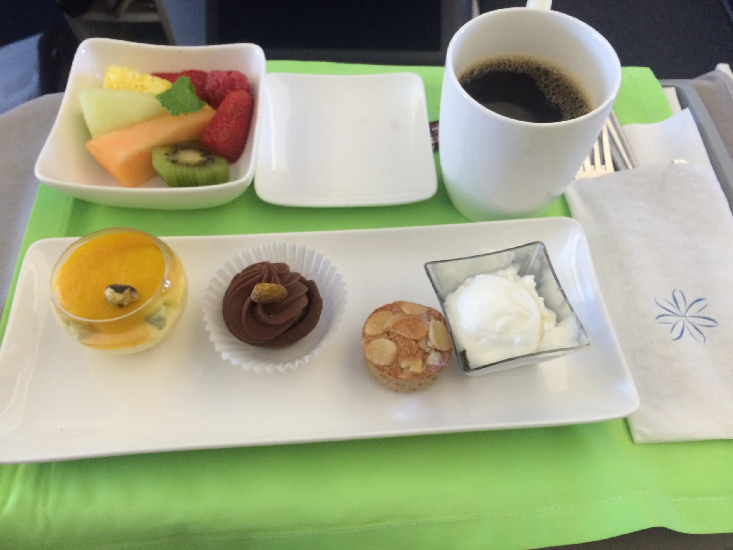 The five-strong dessert course in business class beat the pasta coated in cold soup a few rows back