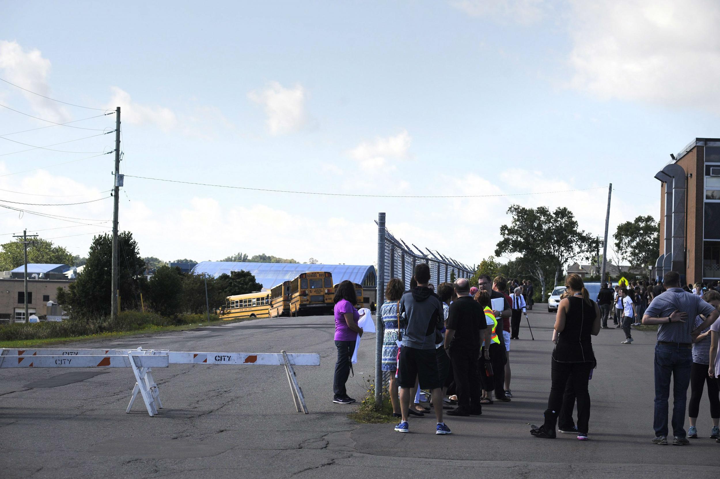 Pupils were herded out of school towards 'safe' designation spots