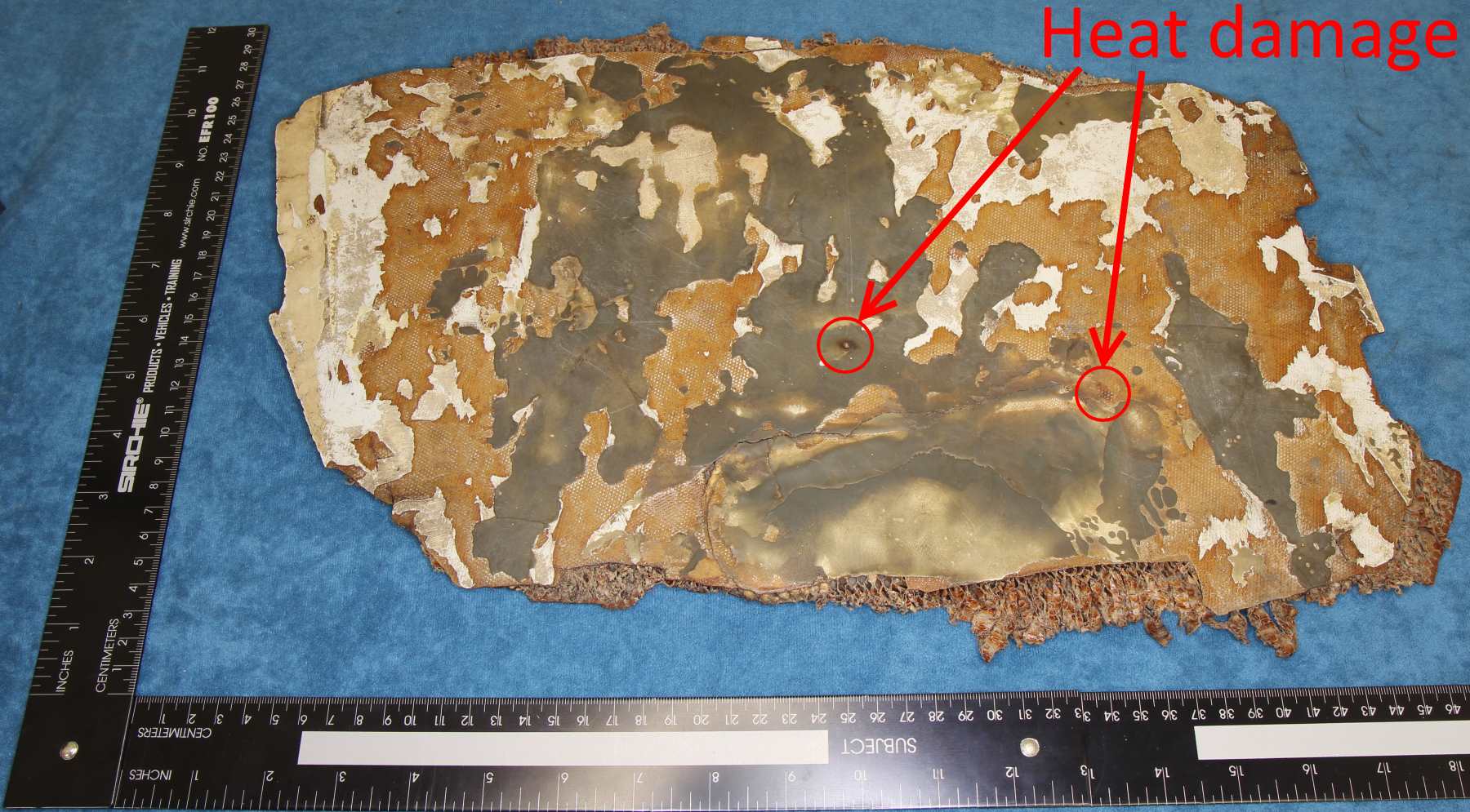 An item of possible MH370 debris shows localised heat damage - but it is thought to be recent