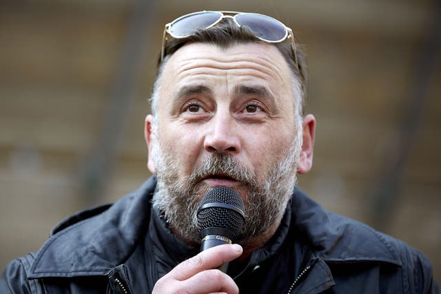 Leader of the anti-Islam Pegida movement, Lutz Bachmann delivers a speech during a Pegida rally against the welcoming of refugees, in downtown Utrecht, on October 11, 2015