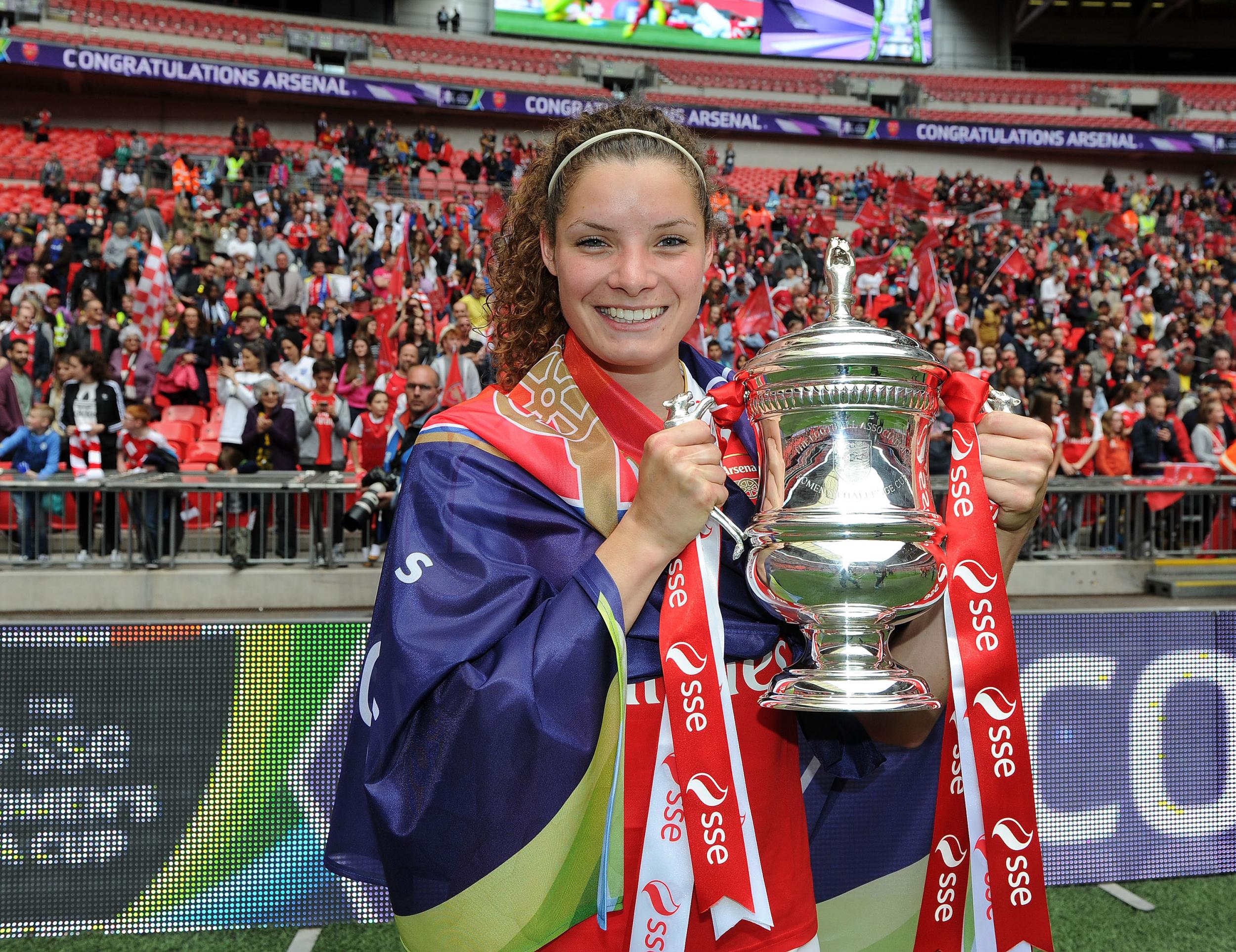 Janssen with the FA Cup after their 1-0 victory against Chelsea Ladies in last May's final
