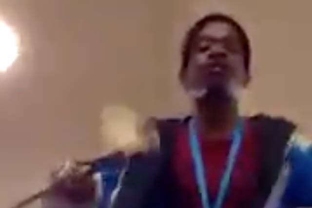 A video ends as Rhodes Must Fall activist Ntokozo Qwabe lunges towards the camera with a stick