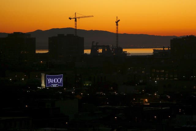 A sign advertising the internet company Yahoo is pictured at sunrise in San Francisco, California