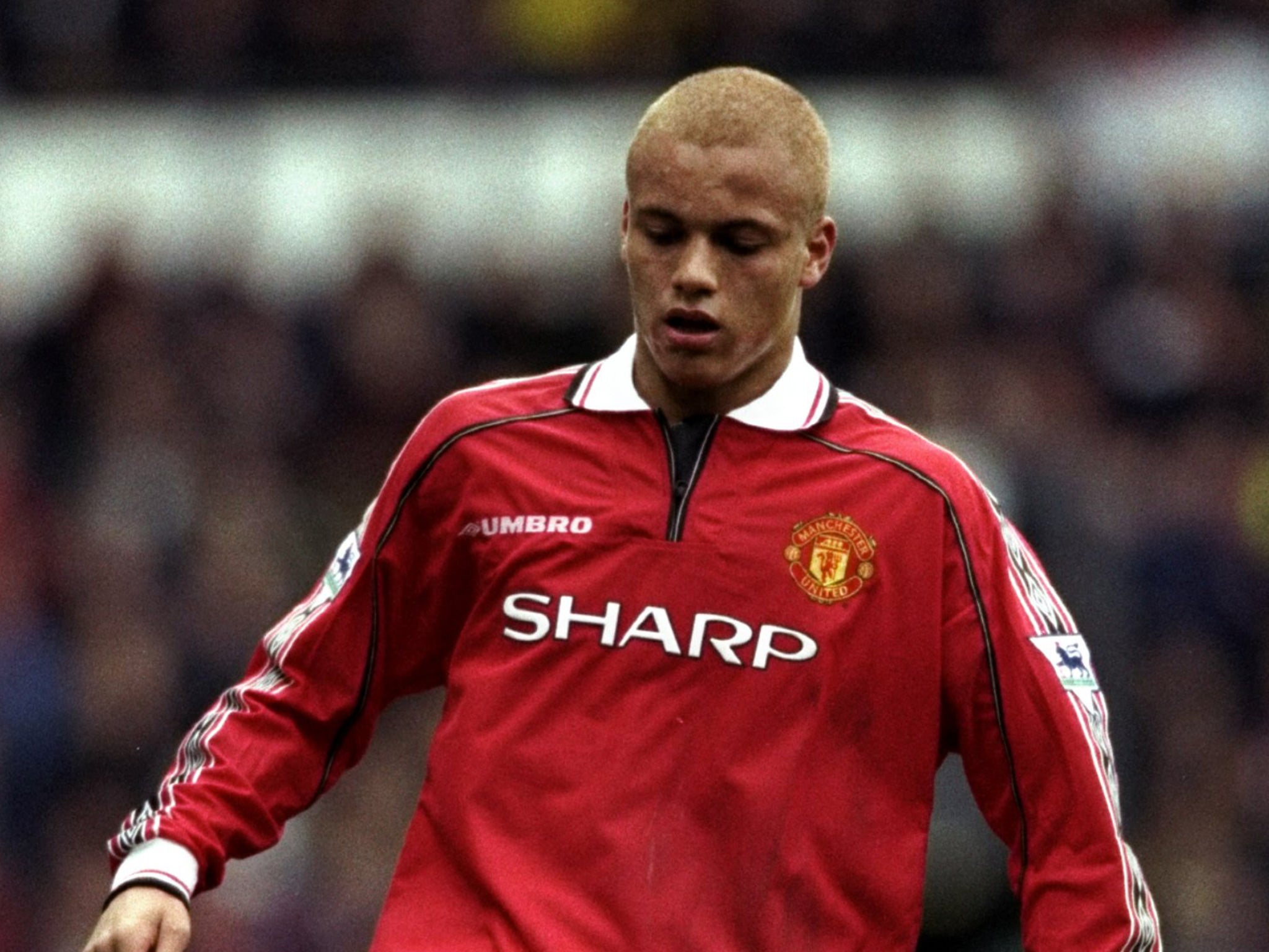 Brown in action for Manchester United against Derby in 1998