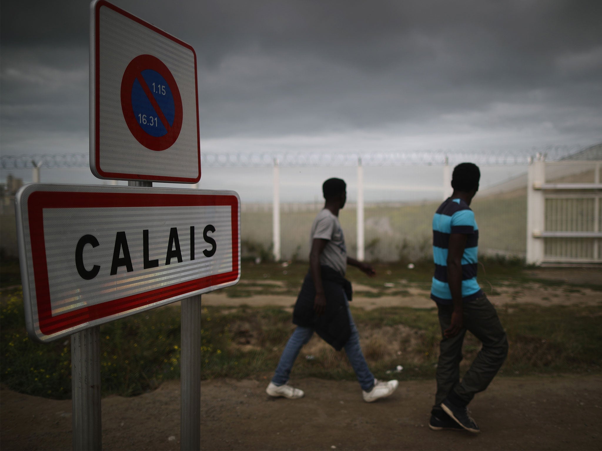 An estimated 10,000 people live in Calais migrant and refugee camps