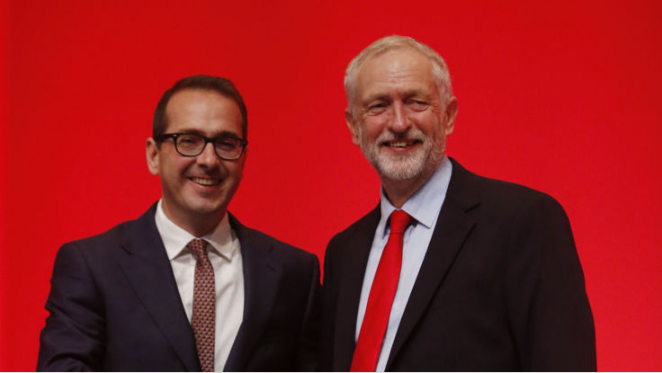 Owen Smith and Jeremy Corbyn share the stage in Liverpool before the leadership election result is announced