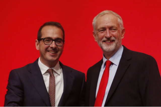 Owen Smith and Jeremy Corbyn share the stage in Liverpool before the leadership election result is announced